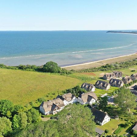 Strandhaus Monchgut: Beachside Retreat with Balcony and Spa Access Lobbe Exterior photo